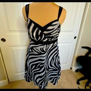 Elegant looking White House black market Zebra Print spaghetti strap dress